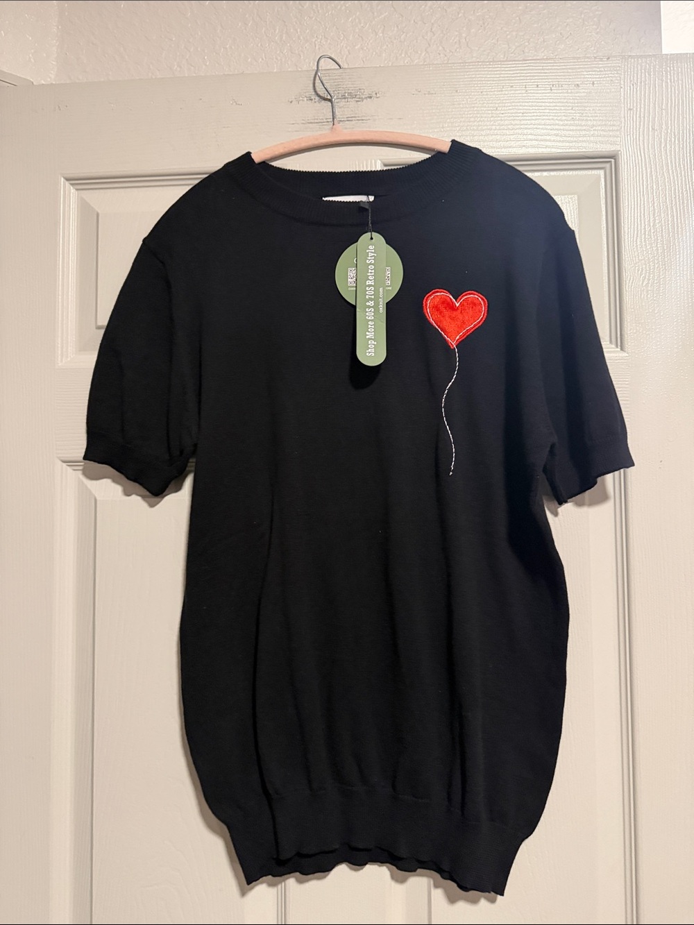 Black Crewneck Sweater with Red Heart Patch